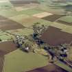 Oblique aerial view centred on the village, taken from the WNW.