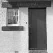 Entrance doorway, detail. Dalgorm, Park Road, Lamlash.