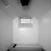 Interior, cell block.
View of specimen cell seen from door, ground floor.