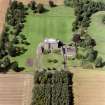 Oblique aerial view centred on the country house, garden, pavilions and lodges, taken from the SE.