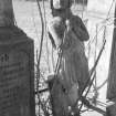 Detail of memorial figure, Ayton churchyard.