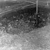 Digital copy of excavation photograph: view of trench.

