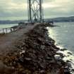 Rock-fill causeway to North Main Tower damaged by storm. View South.
Copy of original 35mm colour transparency
Survey of Private Collection