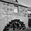 General view showing water-wheel.