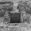 View of the gatehouse pit under excavation by M Apted in 1955.