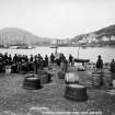 Historic photograph showing view of Castlebay from harbour.