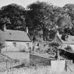 General view of rear of nos. 7, 13 and 15 Manse Road, Carmunnock, Glasgow from North-West.