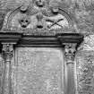 Glasgow, Carmunnock, Kirk Road, Carmunnock Parish Church.
General view of mural monument to the children of Andrew Tate, died 1734. Inscribed panel between Corinthian columns, with scrolling pediment with central winged soul, skull, hour-glass and crossed bones.
