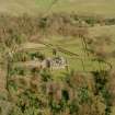 Oblique aerial view of Charleton House centred on a country house, taken from the W.