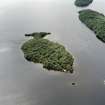 Oblique aerial view centred on Clairinsh Island with crannog adjacent, taken from the NE.