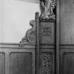 Copy of photograph showing detail of panelling with praying angel motif.