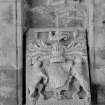 Detail of carved armorial plaque.