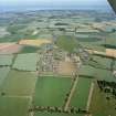 General oblique aerial view looking across the town of Chirnside, towards the North Sea coastline in the distance, taken from the WSW.