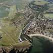 Oblique aerial view centred on the harbour, taken from the NNE.