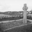 View of Father Allan Macdonald's grave and carved cross.