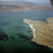 Oblique aerial view centred on the township with the causeway adjacent, taken from the SSW.