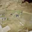 Oblique aerial view centred on the farmhouse, with the farmstead and the farmsteading adjacent, taken from the NW