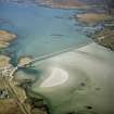 Oblique aerial view centred on the causeway, taken from the NNW.
