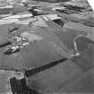 Scanned image of oblique aerial view centred on the airfield, taken from the W.