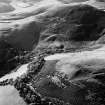 Scanned image of oblique aerial view centred on the remains of rig and field banks, taken from the ENE.