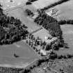Oblique aerial view centred on Aboyne Castle and Policies, looking to the SW. 

