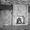 Interior.
View of front hall and fireplace.