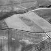 Oblique aerial view centred on the cropmarks of an unenclosed settlement, ring ditches, possible souterrain and circular enclosure at Newbarns, looking to the SE.