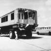 Glasgow Airport, Abbotsinch. 
View of mobile lounge at Dulles International Airport. Comparison photograph.