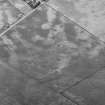 Oblique aerial view centred on cropmarks of the unenclosed settlement, roundhouses, pits and rig at Pittengardner, looking to the WNW.