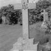 Digital copy of photograph of  cross with 3 step base commemorating William Allan Carter (?), died 1921.
Survey no. 6