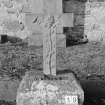 Digital copy of photograph of cross with rose carving.  Inscription completely eroded.
Survey no. 19
