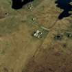 Oblique aerial view centred on the church and manse, taken from the N.