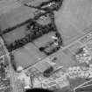 General oblique aerial view centred on the village of Blackburn, looking to the WNW.
