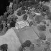 Oblique aerial view centred on Meikleour House and policies, looking to the NNW.