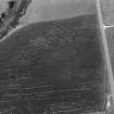 Oblique aerial view centred on the cropmarks of the circular enclosure at Barflat, looking to the SSW.