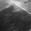Oblique aerial view centred on the cropmarks of the circular enclosure at Barflat, looking to the SW.