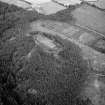 Oblique aerial view centred on the remains of the vitrified fort at Craig Phadrig, looking to the WSW.