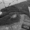 Oblique aerial view centred on the remains of the vitrified fort at Craig Phadrig, looking to the S.