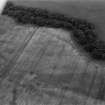 Oblique aerial view centred on the cropmarks of the enclosed settlement at Wellford, looking to the SSE.