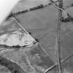 Oblique aerial view centred on the cropmarks of the unenclosed settlement, ring ditches, souterrain, rig and rectinlinear enclosure at Arrat's Mill, looking to the WNW.