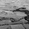 Oblique aerial view centred on the cropmarks of the rig at Wardhouse and Fallow Hill, looking to the SE.