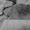 Oblique aerial view centred on the cropmarks of the Roman Temporary Camp, unenclosed settlement and possible ring ditch at Stracathro and Ballownie, looking to the SW.