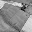 Oblique aerial view centred on the cropmarks of the unenclosed settlement, rectilinear enclosures, souterrains, barrows, ring ditches, linear features and pits at Newbarns, looking to the S.