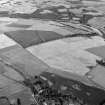 Oblique aerial view centred on the cropmarks of the Roman Temporary Camp at Normandykes, looking to the SE.