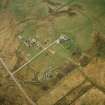 Oblique aerial view centred on the hotel, walled garden, farmsteading and farmhouse, taken from the E.