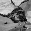 Oblique aerial view of Tarradale House with the cropmarks adjacent, looking to the NNW.