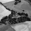 Oblique aerial view of Tarradale House with the cropmarks adjacent, looking to the ESE.