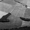 General oblique aerial view centred on the cropmarks of a possible unenclosed settlement at the Hill of Laithers, looking to the ESE.