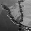 Oblique aerial view centred on the cropmarks at Haughs of Kinnaird, looking to the SW.