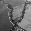 Oblique aerial view centred on the cropmarks at Haughs of Kinnaird, looking to the SW.